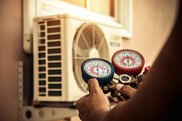 Professional Air Conditioning Service technician working in Fallston, MD
